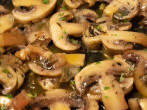 Carl uses clarified butter (ghee) as his oil when saute'ing mushrooms.